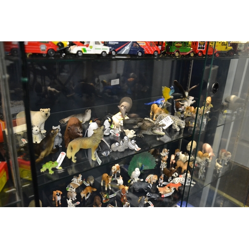 177 - Lrg qty Schleich animal figurines on shelf