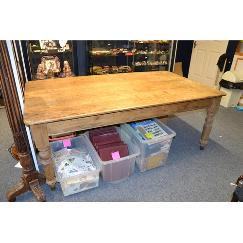 345 - Stripped pine farmhouse table, w 118cm , l194cm x h 75cm