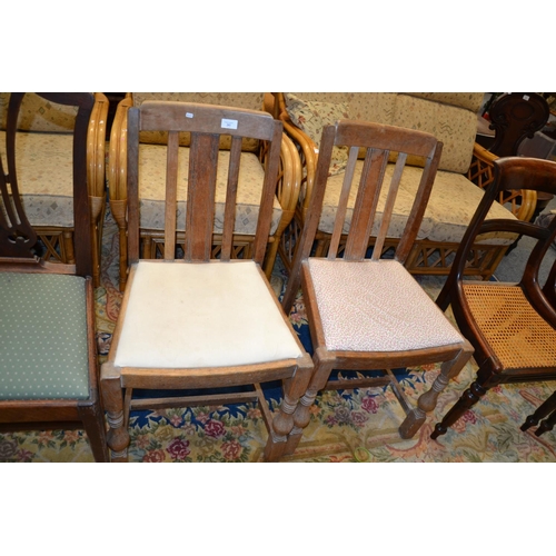 735 - Pair of blonde oak kitchen chairs