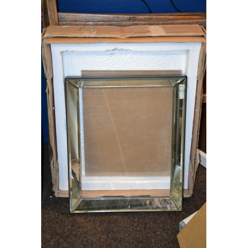 110 - New mirrored frame in box