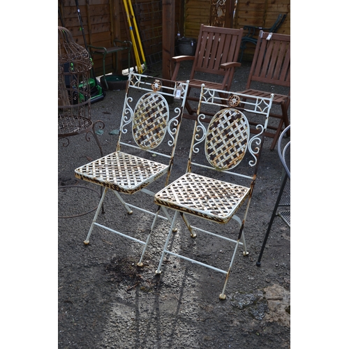 108 - Pair of white painted weave design metal outdoor chairs. collected