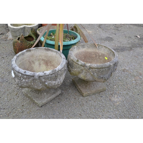 112 - Pair of concrete garden urn planters. D40cm h33cm