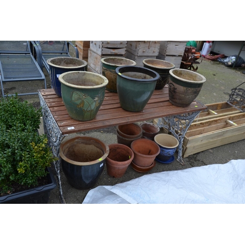 118 - Teak topped garden table with metal frame legs. L124cm w67cm