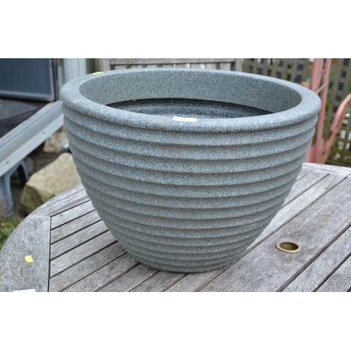 145 - Large circular fibreglass planter