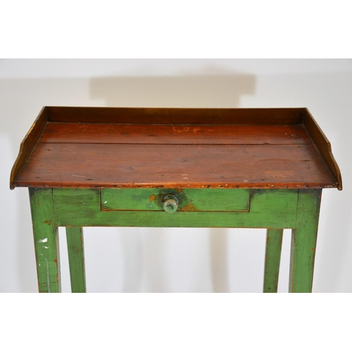95 - Victorian tapered legged writing table with compartmentalised drawer, base painted green
