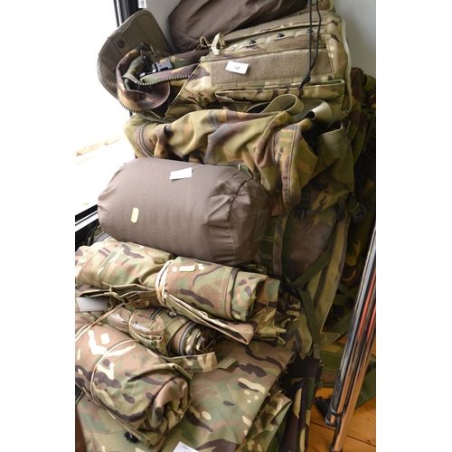 7 - Qty of Military issue gear inc. air beds, water proof clothing etc.