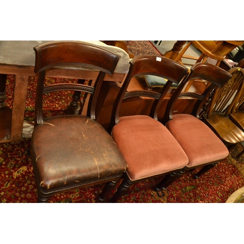 712 - Three Regency flame mahogany dining chairs