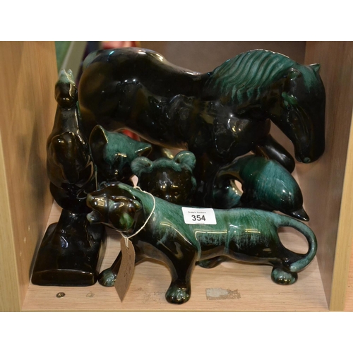 273 - Six terracotta green drip glazed animal groups