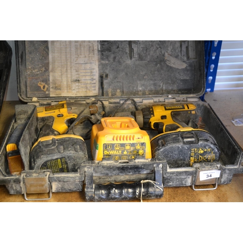 34 - 14.4 Volt Dewalt DW054 impact driver, 118v DC725 combi drill + charger