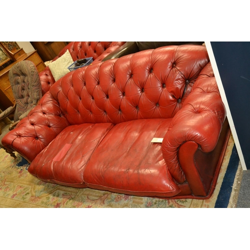 622 - Oxblood red button backed chesterfield style 3 seat sofa. width 205cm