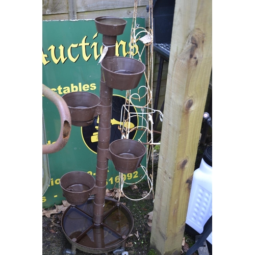 179 - 5 tier plastic planter + obelisk climber