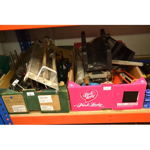 49 - 2 cardboard boxes of tools inc. Mitre boxes, manual tile cutters etc.