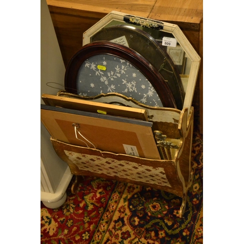 809 - Various framed maps + mirror and framed fabric display in an Italian gilt magazine rack