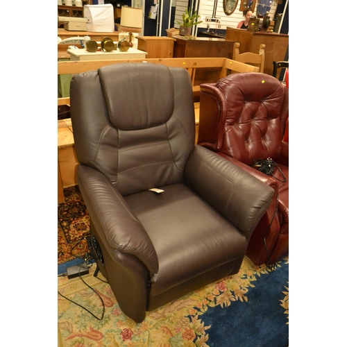 820 - Dark leather riser recliner in excellent working order and condition.