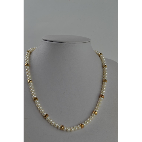 368 - String of pearls with 9ct clasp & yellow metal spacers testing positive for gold