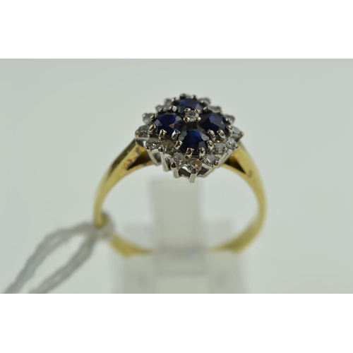 371 - 18ct gold, sapphire & diamond cluster ring, size T