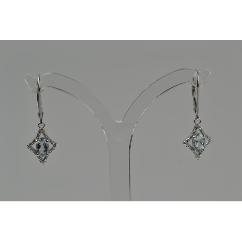 372 - Pair of 9ct white gold, aquamarine & diamond pendant earrings