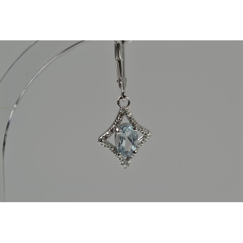 372 - Pair of 9ct white gold, aquamarine & diamond pendant earrings