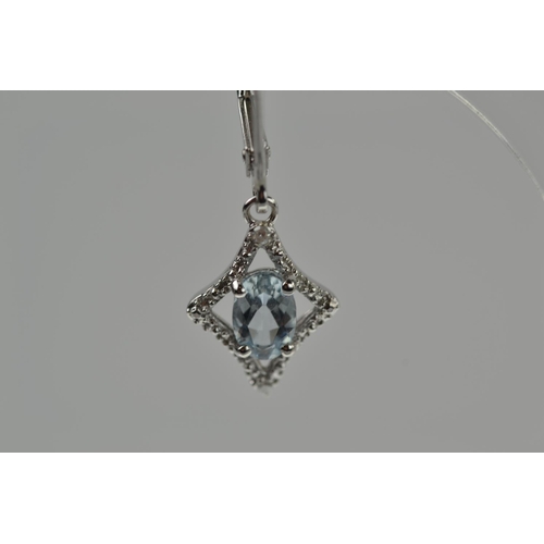 372 - Pair of 9ct white gold, aquamarine & diamond pendant earrings