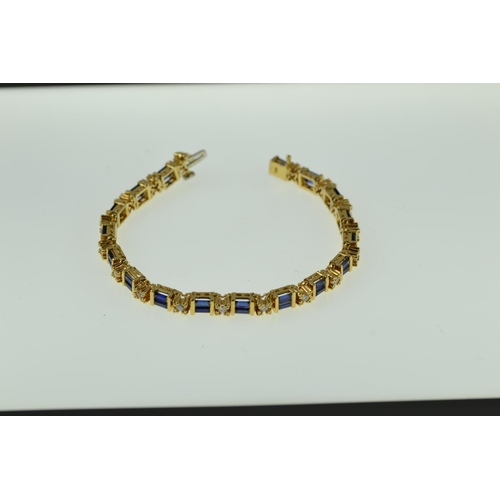 374 - 18ct gold, sapphire & diamond bracelet