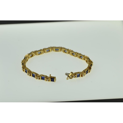 374 - 18ct gold, sapphire & diamond bracelet