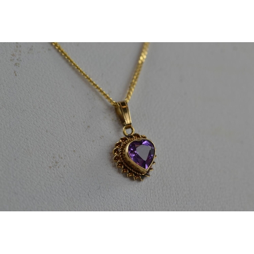 376 - 9ct gold & amethyst pendant & chain