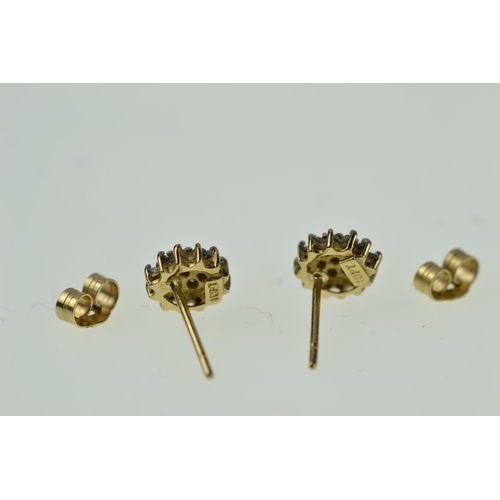 379 - Pair of 9ct gold & diamond cluster stud earrings