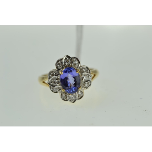 383 - 18ct gold, tanzanite & diamond cluster ring, size O