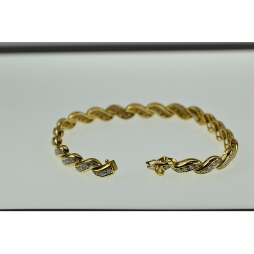 390 - 18ct gold & diamond bracelet, tdw 2ct