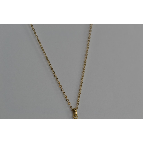 394 - 9ct gold & blue stone pendant & chain