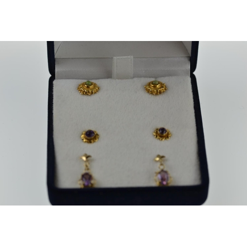 395 - Three pairs of 9ct gold earrings, one pair missing butterflies