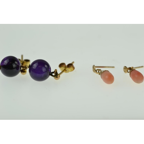 396 - Two pairs of 9ct earrings, inc. amethyst & coral, the latter missing butterflies