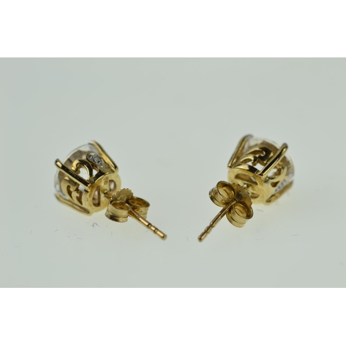 397 - Pair of 9ct gold earrings