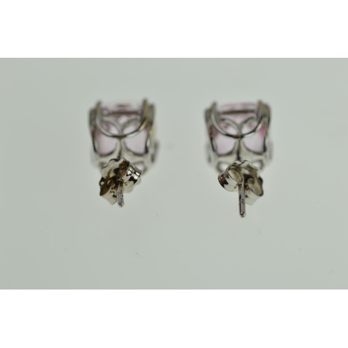 398 - Pair of 14ct white gold stud earrings