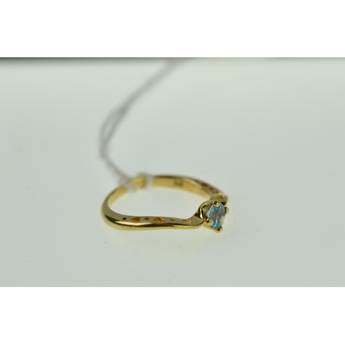 415 - 18ct gold & topaz ring, size J