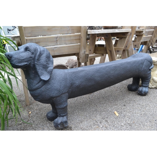 119 - Large decorative fibre glass Dachshund seat. Length 146 CM. Seat height 42 CM.