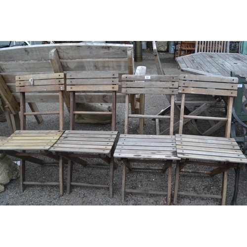 123 - 3 Folding teak garden chairs. 1 with crack to back