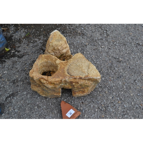 28 - Small triangular stone feature with impressed shell detail