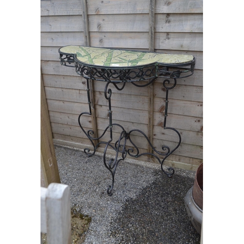 57 - Trifoil metal framed hall table with bamboo decorated top. Height 90 CM. Width 86 CM. Depth 40 CM.