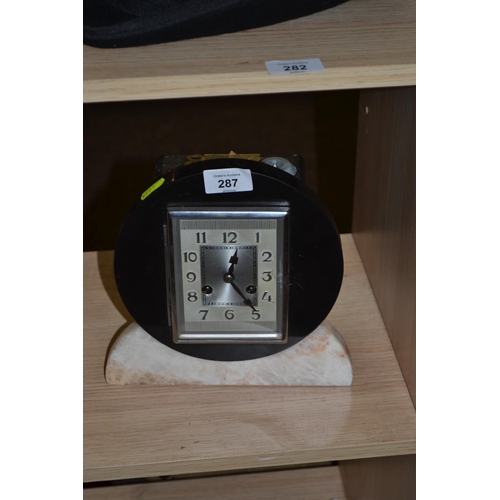 262 - Marble art deco style mantle clock. Height 23 CM.