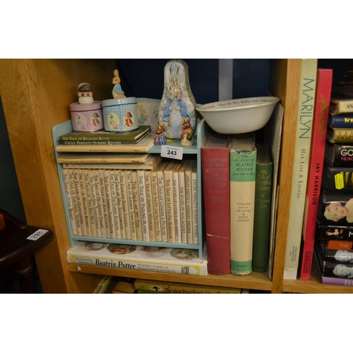243 - Shelf of Beatrix books inc. Peter Rabbit book shelf and other related items inc. Wedgewood bowl