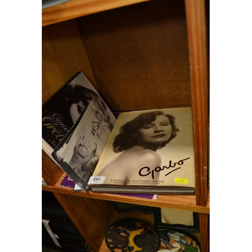 251 - Greta Garbo books, postcards & others