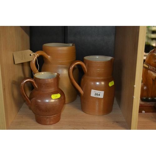 264 - 3 French stoneware graduated jugs