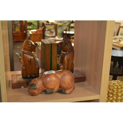 265 - Pair of cat book ends and single cat that peers over the shelf with an attentive gaze