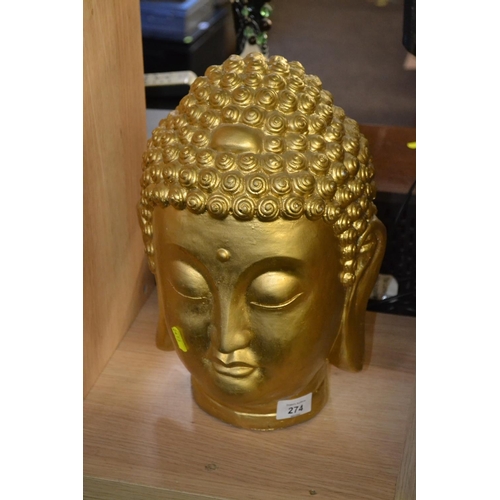 274 - Gilt painted plaster Buddhas head. 43cm high