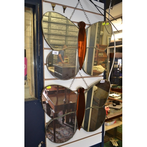 494 - 2 butterfly mirrors. Width 57 CM.