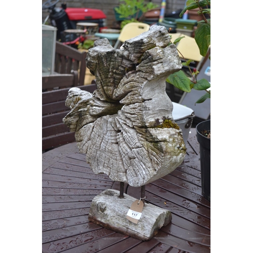 117 - Tree cross section garden ornament. Height 56 CM.