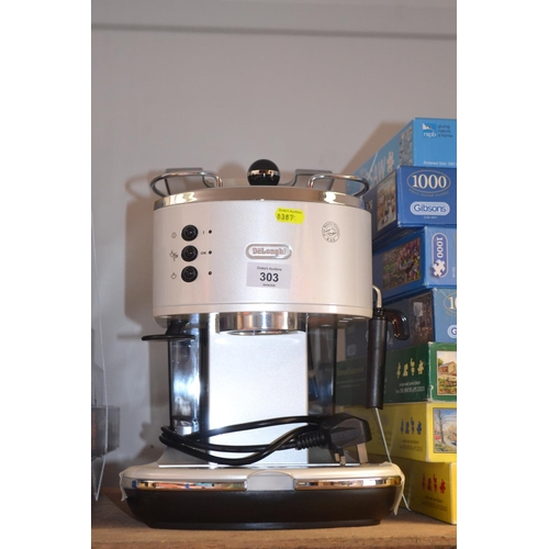 303 - Delonghi coffee maker. Tested in working order.