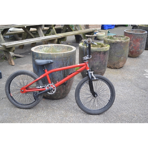 96 - Red and black haro BMX with gyro spinner brakes. Frame size 11 inches