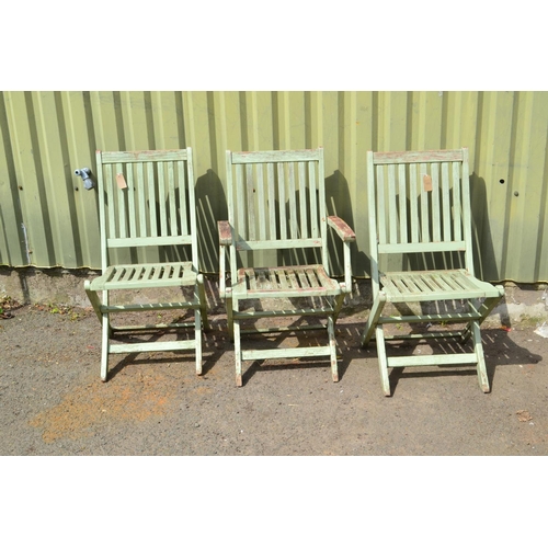 87 - 3 green painted folding chairs, some wobbles